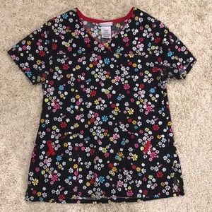 Woman’s Black and flower scrub top